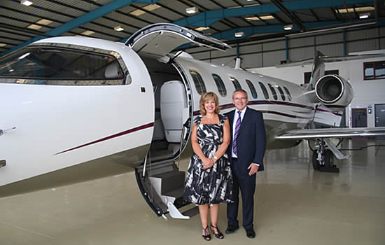 Alison Jones, Head of Aviation at Paragon, with Stuart Mulholland, Managing Director at Zenith Aviation Limited, with the new LearJet 75 at London Biggin Hill Airport.