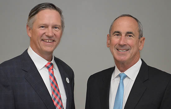 David Davenport (left) and Ray Johns succeed Bruce Whitman as co-CEOs of FlightSafety International.