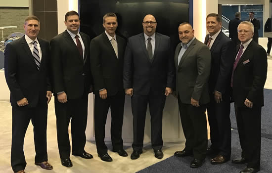 Members of the GE Aviation and King Aerospace management teams met at NBAA-BACE on Oct. 17 to finalize the agreement making King a member of the GE OnPoint™ authorized service center network | Photo: GE Aviation.