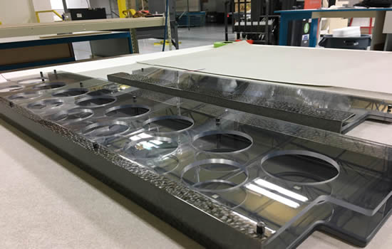 The first hammered metal-look glass racks were manufactured at MSB Aerospace LLC in Savannah.