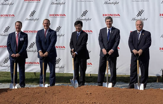 (L to R): Executive Director of the Piedmont Triad Airport Authority Kevin Baker, Rep. Ted Budd (R-NC), Honda Aircraft Company president and CEO Michimasa Fujino, Governor Roy Cooper (D-NC) and North Carolina Secretary of Commerce Anthony Copeland participating in the ceremonial groundbreaking at Honda Aircraft Company's headquarters in Greensboro, NC on July 30th, 2019.