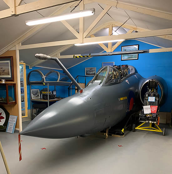 The indoor collection includes the forward fuselage and cockpit of a Buccaneer strike aircraft.