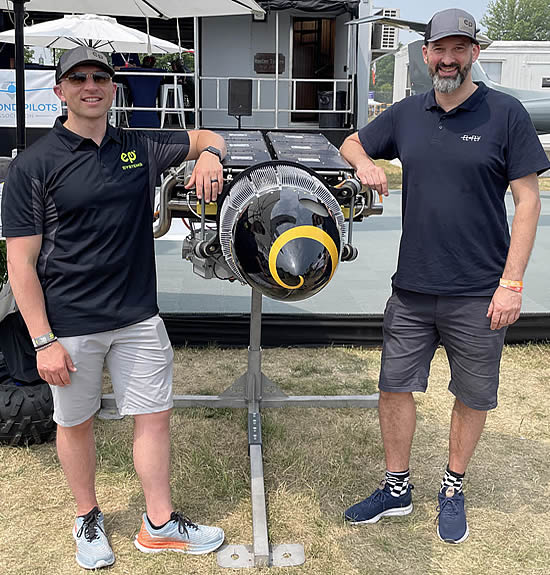 Announcing a partnership at Oshkosh 2023: Nathan Millecam, Co founder, CEO at EPS with Eric Lithun, Founder, CEO at Elfly