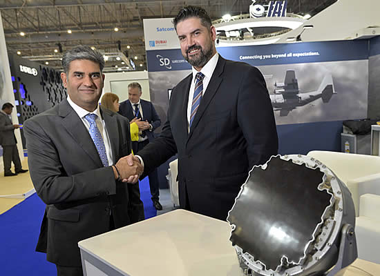 Paras Dhamecha, founder and managing director at Empire Aviation (left), shakes hands with David Falberg, SD VP International at Dubai Airshow 2023.