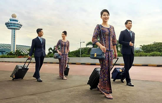 Singapore Airlines' iconic cabin crew sarong kebaya, adapted by Parisian couturier Pierre Balmain | Photo courtesy of Singapore Airlines.