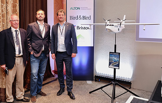 Left to right: James Labouchere, Managing Director, Ocean Aircraft; George Alafinov, Managing Director, Jekta and Eric Lithun, CEO, Elfly Group - with model of Noemi.