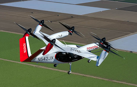 Joby-Toyota-Flight: Joby’s electric air taxi in flight above the company’s manufacturing and flight testing center in Marina, California | Photo: Joby Aviation.