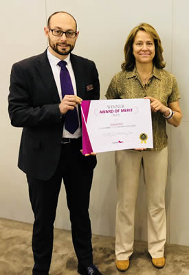 Erwan Clolery (left), Safety and Compliance Monitoring Manager, TAG SA, and Patricia Davis, Head of Compliance and Safety, TAG (UK) Ltd receiving the EBAA’s Diamond Safety of Flight Award at EBACE 2018.